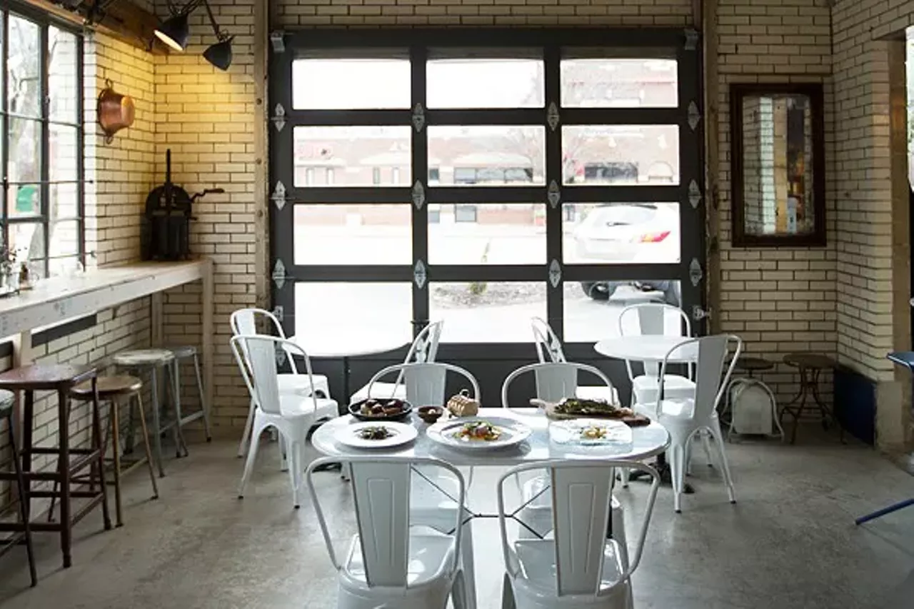 Olio It&#146;s no surprise that Ben Poremba&#146;s Isreali-inflected wine bar, Olio (1634 Tower Grove Avenue, 314-932-1088) serves up great food. Poremba, after all, is one of the city&#146;s most acclaimed chefs. What might be surprising to first-time visitors, though, is just how much it retains its bar feel, even though the menu items it&#146;s serving are good enough to carry a restaurant. Located in a renovated Standard Oil filling station, the quarters are close, lending an intimate vibe. Something about the mood here makes us want to have another glass of wine and start spilling our intimate secrets &#151; and isn&#146;t that what all great wine bars should do? Poremba&#146;s food isn&#146;t cheap (we&#146;re guessing no one else in St. Louis could get away with charging $14 for hummus), but the quality underpins the pricing (that hummus, we&#146;ll have you know, is studded with almonds, pine nuts and even braised lamb shoulder). Grab a seat at the bar for &#147;spritz hour&#148; and tuck into a platter of mezze, and with or without libations, you&#146;re sure to be feeling fine. Photo courtesy of Jennifer Silverberg
