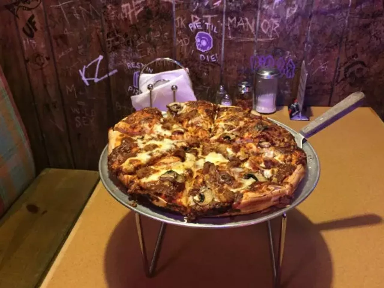 The Black Thorn Pub & Pizza How good is the pizza at the Black Thorn Pub & Pizza (3735 Wyoming Street, 314-776-0534)? Would you believe it if we told you that famously impatient St. Louisans routinely wait more than an hour for it &#151; or that people who don&#146;t even like bars (yes, such people exist) have been queuing up at this dive bar for two decades just to eat it? Both things are true. Now, to like the food here, you need to like deep-dish pan pizza, which isn&#146;t for everybody. But if that&#146;s your jam, and you&#146;re into some seriously heavy food, you might as well join the club. Nine-tenths of St. Louis can&#146;t be wrong, can it? Photo courtesy of Jenna Murphy