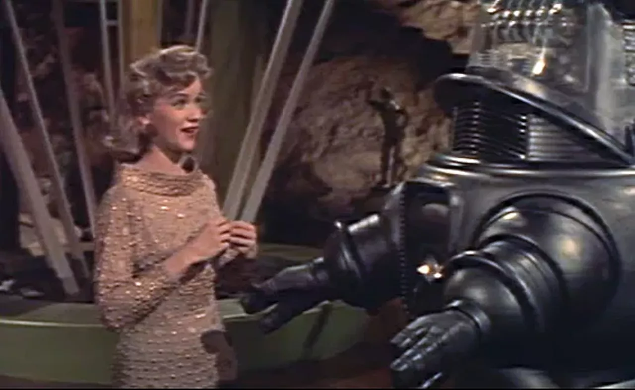 9. Forbidden Planet (1956) A dutiful robot named Robby speaks 188 languages. An underground lair provides astonishing evidence of a populace a million years more advanced than earthlings. There are many wonders on Altair-4, but none is greater or more deadly than the human mind. Forbidden Planet is the granddaddy of tomorrow, a pioneering work whose ideas and style would be reverse-engineered into many cinematic space voyages to come. Leslie Nielsen portrays the commander who brings his spacecruiser crew to the green-skied Altair-4 world that's home to Dr. Morbius (Walter Pidgeon), his daughter (Anne Francis), the remarkable Robby...and to a mysterious terror.
