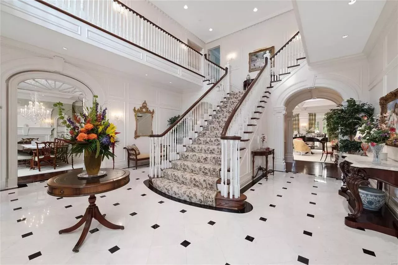 20 Upper Warson Rd, Saint Louis, MO 63124 $10,900,000 Locked away from the world behind two large gates is this six-bedroom beauty. Designed in an elegant fashion, this traditional-style house has all of those old-money amenitities like terraces, formal gardens, a Koi pond and a tennis court. Visit the listing page here. Photo credit: Realtor.com