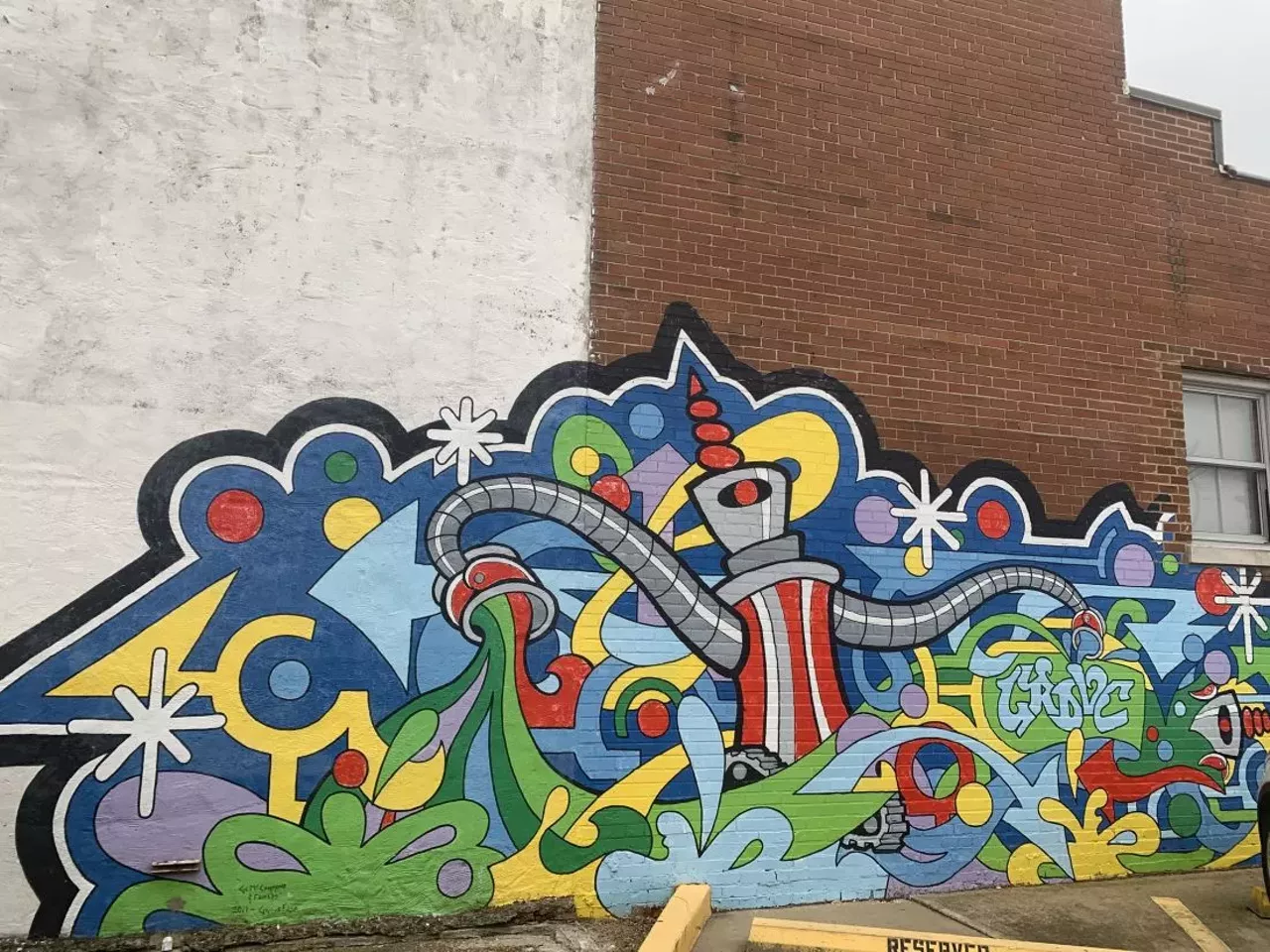 Robot Mural Located in The Grove Mural by Grace Mccammond Photo credit: Riverfront Times / @riverfronttimes on Instagram
