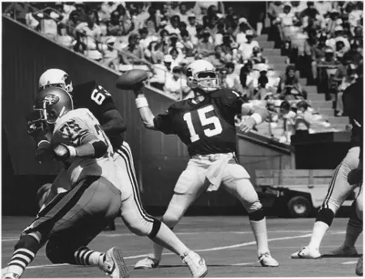 Neil Lomax (No. 15) was Cardinals quarterback from 1981-1988. Unreal takes back the Big Red The Ghosts of St. Louis Football