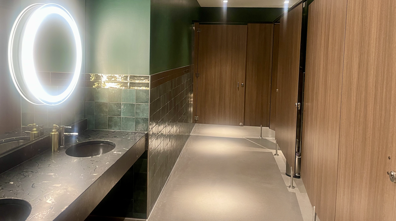 360 Westport When we tell you the women's bathroom at 360 Westport (111 West Port Plaza Drive, Maryland Heights) is fancy, we're not kidding. They are so nice and new — nothing like a newly built or remodeled bathroom not yet soiled by all you pissers. The dark, hunter green walls contrast to the wood-looking stalls and gold fixtures, creating an elegant atmosphere that matches the rest of the bar. But ladies, the true winner in this bathroom is the two LED mirrors making makeup touchups a breeze.
