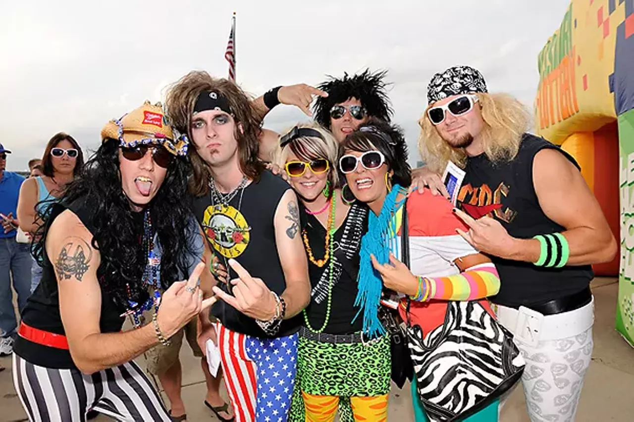 Sure, Slayer and Metallica and whoever may thrash harder, but we looking so-much-fucking-better. From the Poison and Def Leppard show on July 20. See more photos.