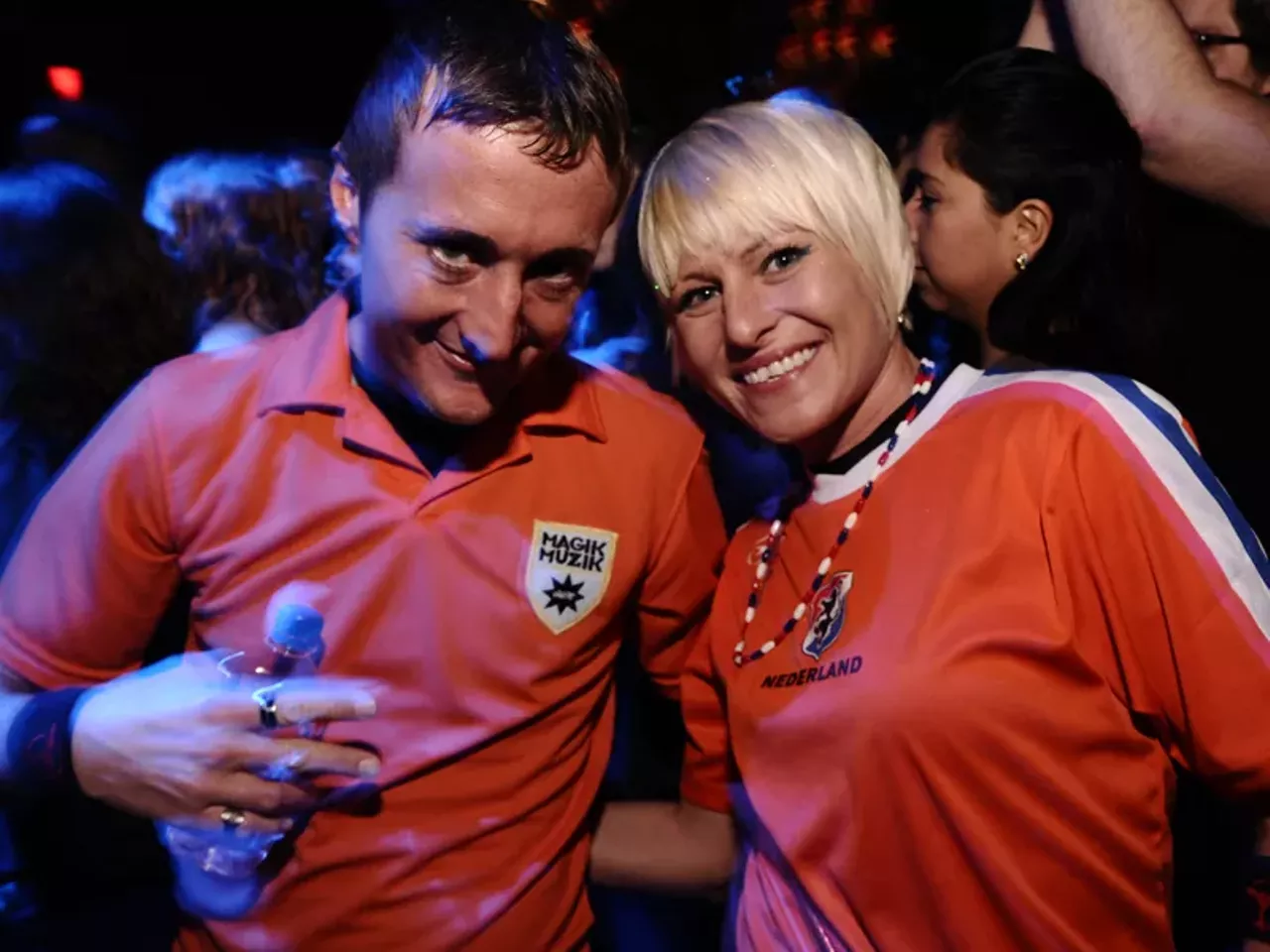 Two techno fans at Tiesto's show at Home Nightclub. See more.
