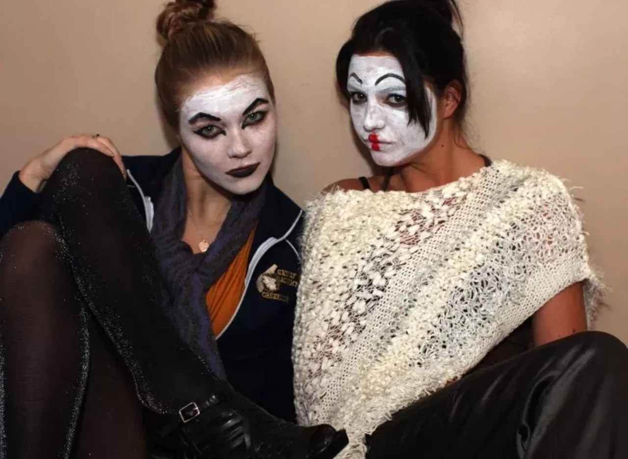 Kayte Wegmann and Amanda Steele hanging out in the dressing room. They are both wearing their own Harajuku creations.
