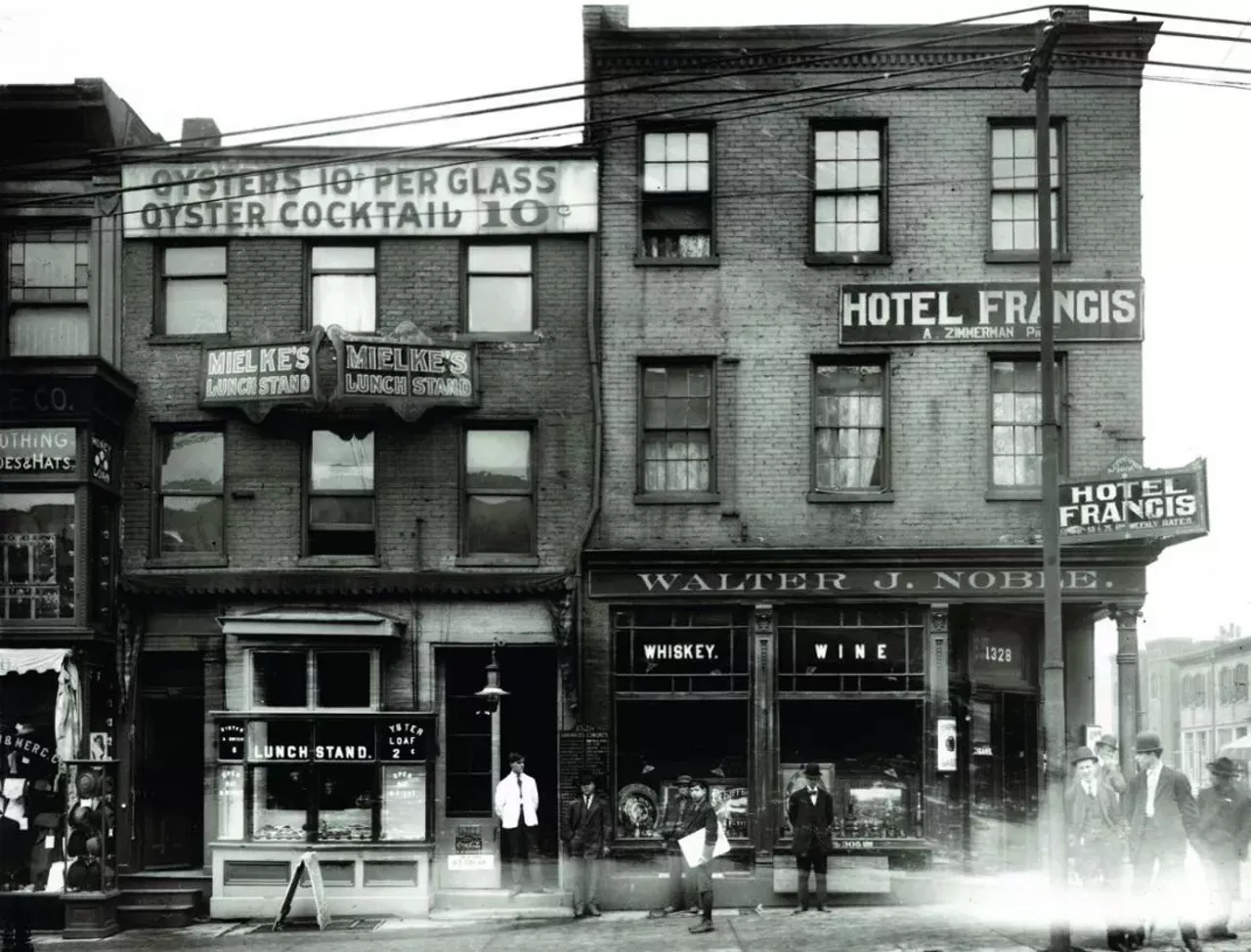 Southeast corner of Market and Fourteenth streets including Mielke&#146;s Lunch Stand, Hotel Francis and Walter J. Noble Whiskey and Wine. Photograph, ca. 1900.