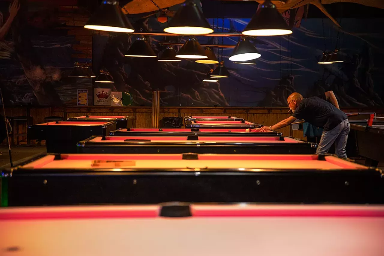 Over in Creve Coeur, the vibe at the Pink Galleon (1243 Castillons Arcade Plaza, Creve Coeur) is pure Gen-X divorcee core. With 28 tables and an abundance of indoor smoking, it makes for the perfect parlor to A) talk about your ex with comrades or B) meet your next. Regardless, the pool crowd here ranges from no-idea-what-I’m-doing to those with average skills. Tables are $9.50 an hour for one or more players, free on Mondays and Wednesdays from 11 a.m. to close and Tuesday, Thursday and Fridays from 11 a.m. to 7 p.m. The Pink Galleon is open 11 a.m. to 1:30 a.m. Monday through Saturday, 11 a.m. to midnight Sunday, closed Sunday.