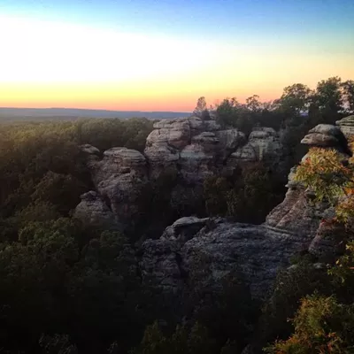 Garden of the Gods 745, Garden of Gods Herod, IL 62947 Estimated drive time: 2 hours, 35 minutes (Directions here) Deep in the heart of Shawnee National Forest sits a hidden gem called Garden of the Gods. Just a short walk from this cliff-side vista are the best primitive campgrounds in these parts. A handful of the campgrounds have stunning views perfect for watching the sunset. If you're more of a cabin type, there are treehouse cabins at Timber Ridge, closer to wine country. Photo by Kelly Glueck.
