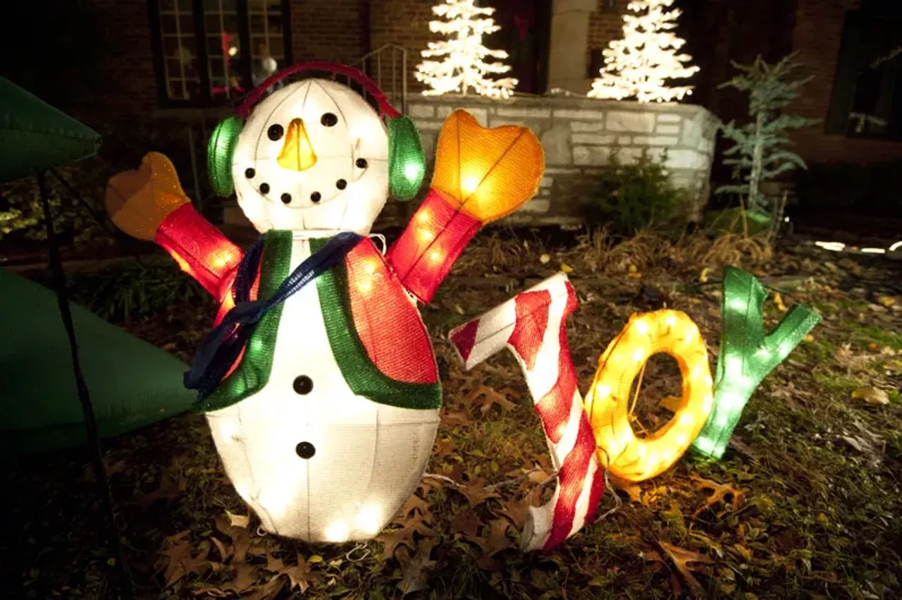 Christmas decorations in front of houses on "Snowflake Street."
