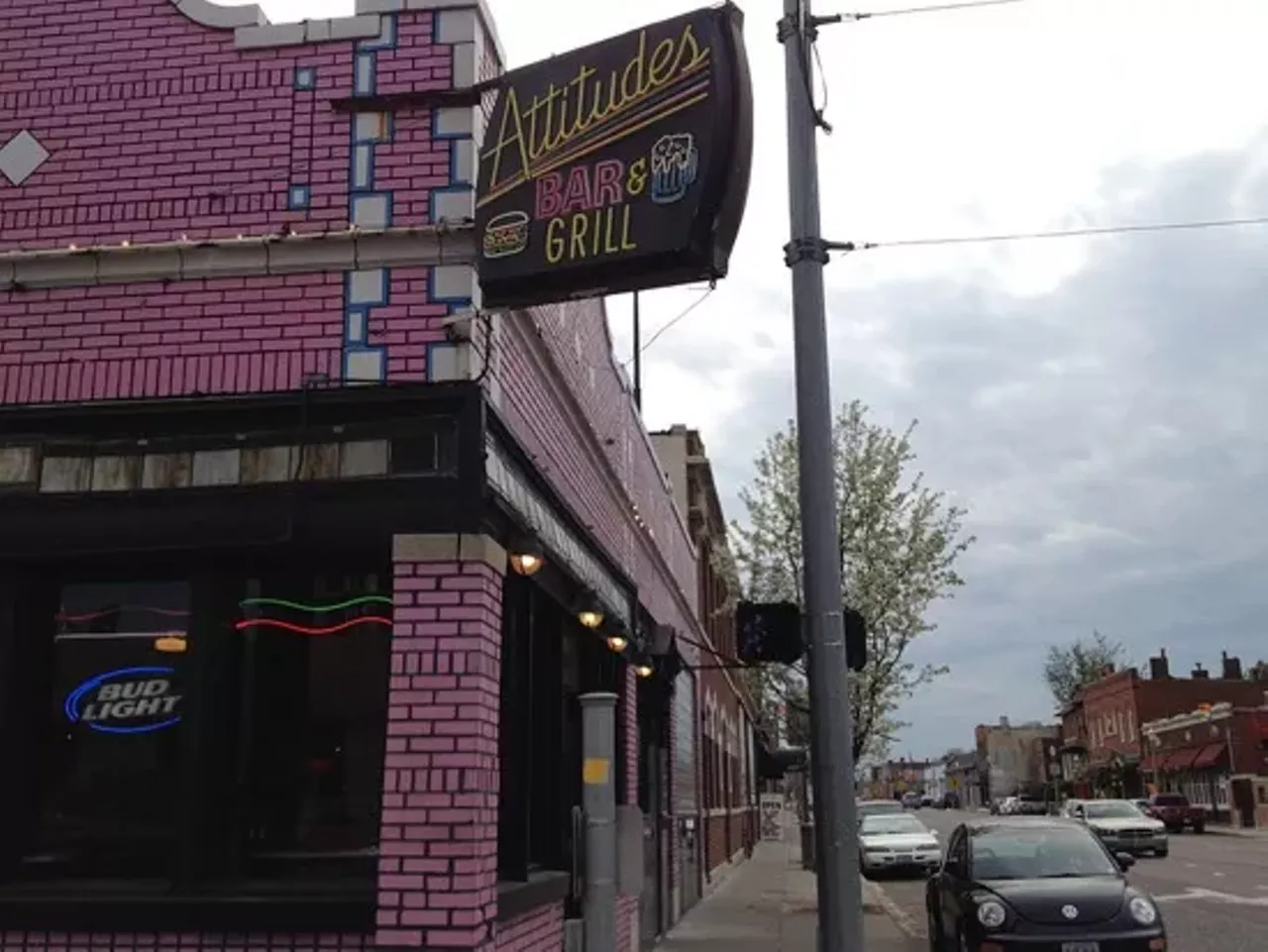 Attitudes Bar & Grill Attitudes was one of St. Louis' first gay dance clubs. It's still everything a club should be: dark, mirrored, crowded and loud. The space has a built-in stage for entertainment and drag shows, but on the weekends it's a full-on hedonistic dance-fest. There's a little cage for the exhibitionists to freak-dance in, a deep dance floor lined with leather couches and a long perch above the crowd to watch the action from above -- highly recommended if you're into people-watching. Visit Attitudes if you're seeking lots of people, reasonable drink prices and bumpin' bass.