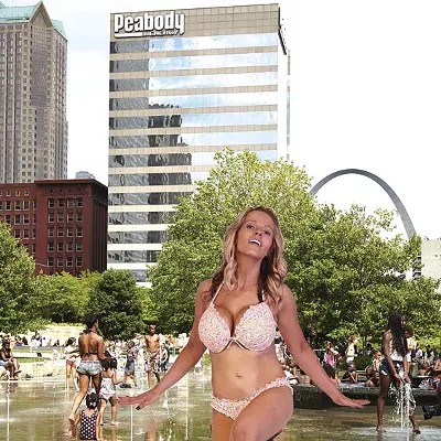 Adults aren't supposed to "lounge" in Citygarden's splash pool, so Rachel must frolic instead in the park's spray plaza. It is open to all &mdash; even dogs.