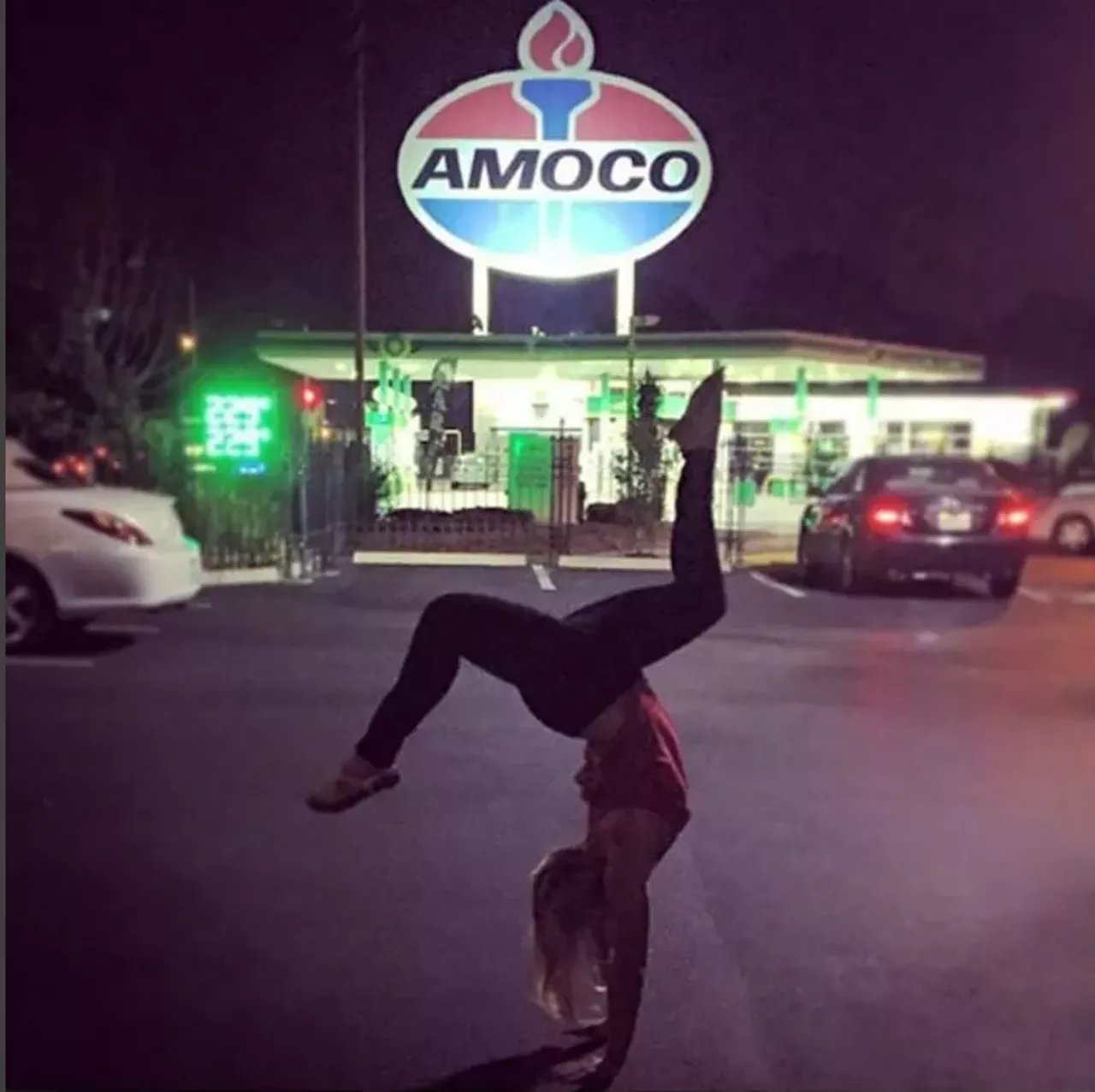 The giant Amoco signBonus points if you can pull off a pose like this. Photo courtesy of Instagram / lharvath.
