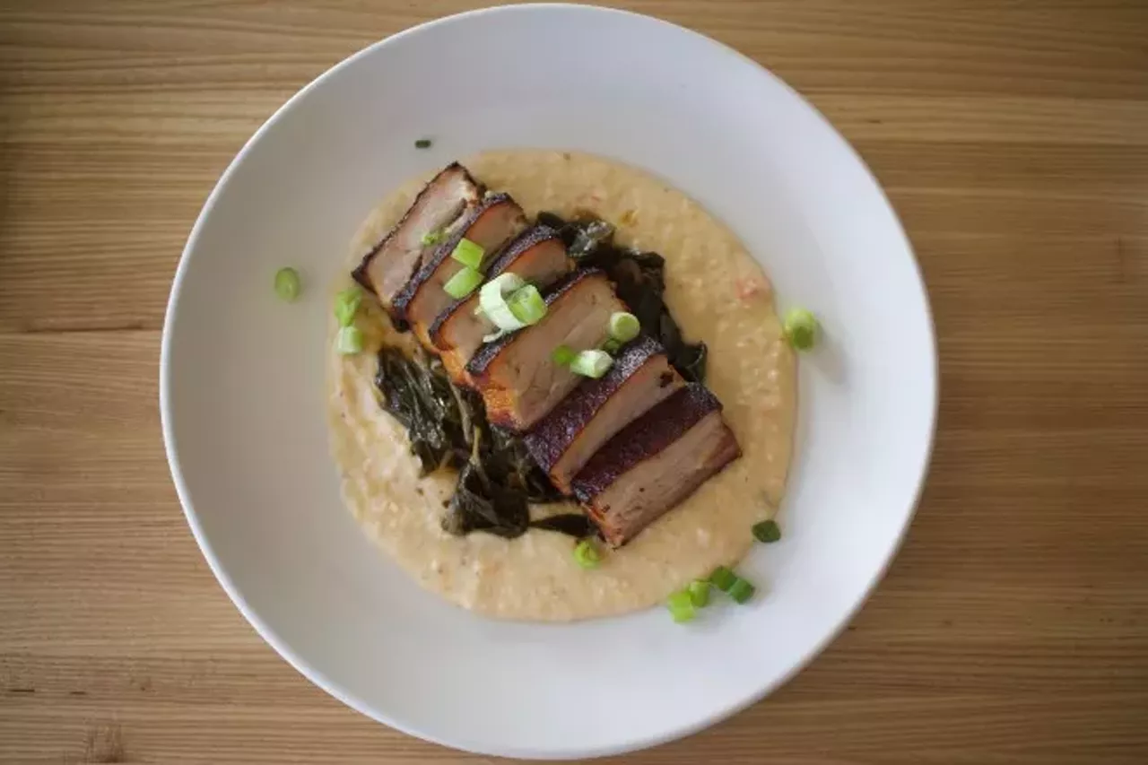 Beast Butcher and Block ( 4156 Manchester Avenue, 314-944-6003) Pictured: Crispy pork belly served over grits with collard greens.