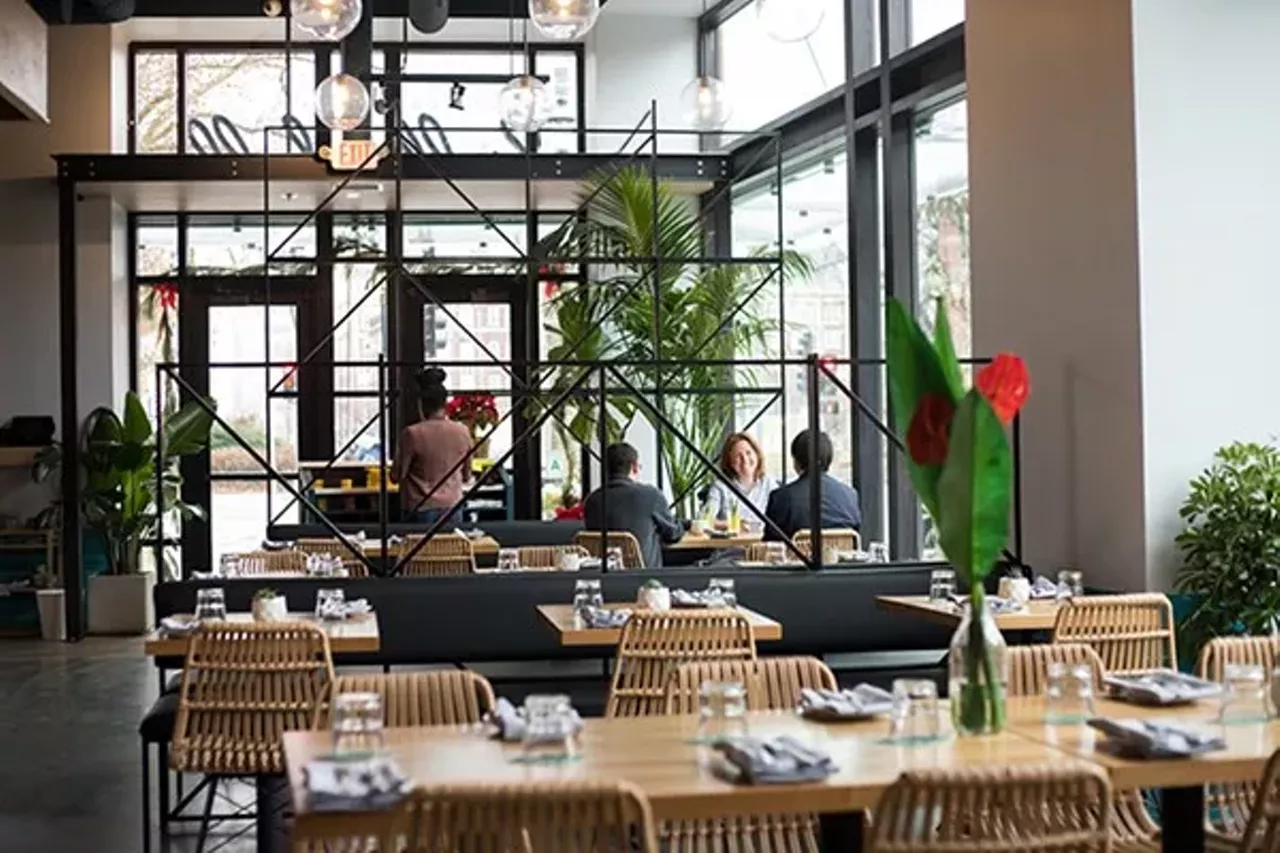 Yellowbelly (4659 Lindell Boulevard. No phone) "Located in the new, ultra-sleek Citizen Park building on the corner of Lindell and Euclid, the restaurant has the feel of a boutique hotel in present-day Waikiki. Floor-to-ceiling glass on two sides of the restaurant fills the open, L-shaped room with light. Industrial metal accents pair with blonde wood, black leather and a shiny, white marble-topped bar to create a modern scene. Alone, these details could provide the canvas for any restaurant. Here, however, they are imbued with a distinctive point of view by prominent features including turquoise tile, a wall-sized mural in shades of blue, white and yellow, and a handful of well-placed plants that evoke palm trees." - Cheryl Baehr Photo credit: Mabel Suen