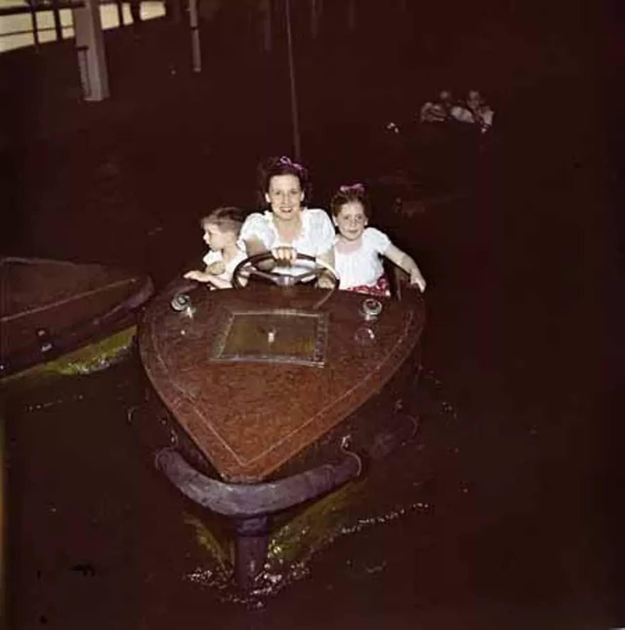 1947. Taking a cruise on the boat ride.
