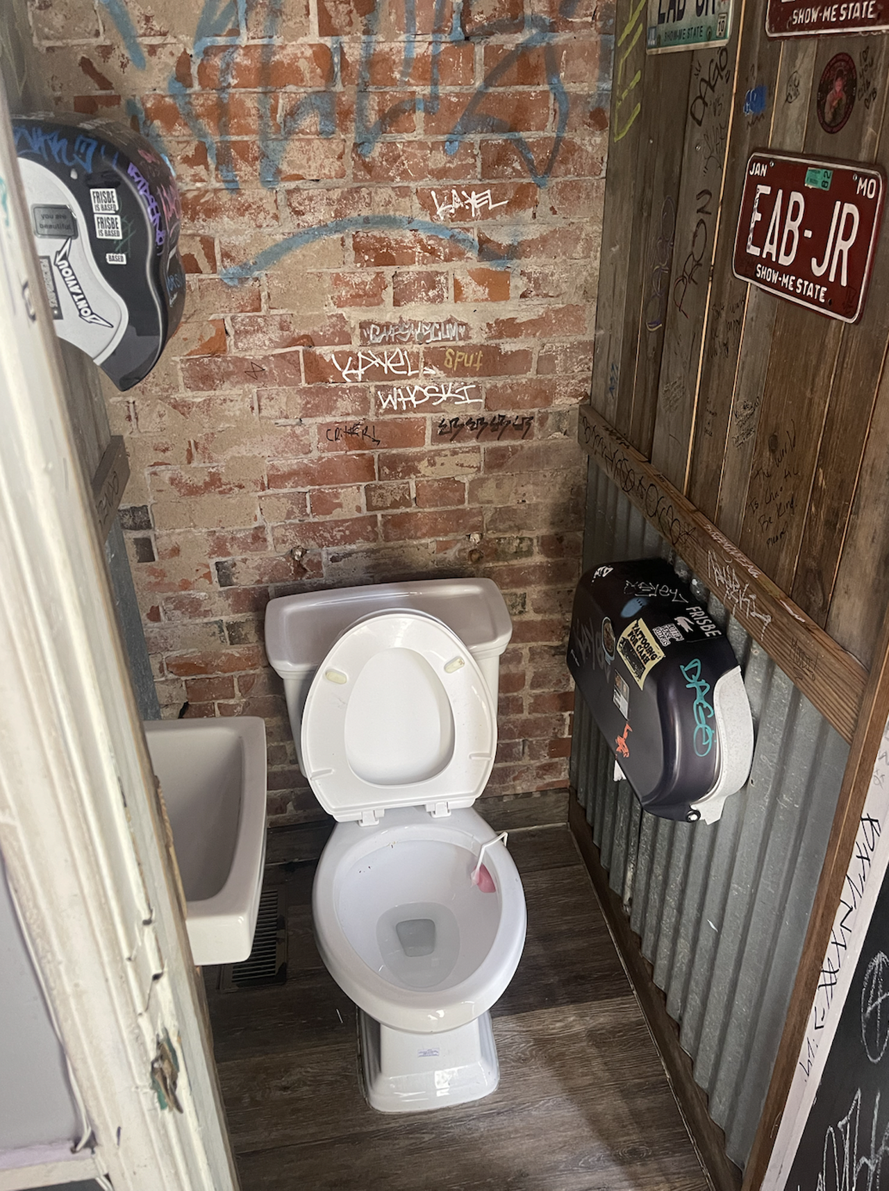 Bootleggin' Bob's For anyone who is almost 6 feet tall, the bathrooms at Bootleggin' Bob's (3457 Morgan Ford Road) will have you screaming. They are so small! Though they are each their own little cubicle, your knees will almost touch the door. It's truly an open-and-sit situation. But here's the good part, you don't even have to get off the toilet to wash your hands. Plus, they might be small, but they were also pretty darn clean and had a nice fresh, floral smell to them. 