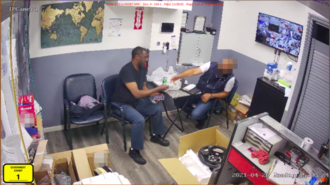 Former Alderman Jeffrey Boyd caught on camera taking a bribe from "John Doe," widely believed to be Mohammed Almuttan.