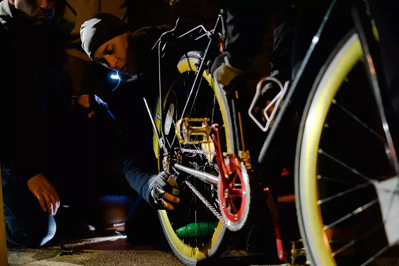 On-the-spot bike repair in Fox Park. - Phuong Bui