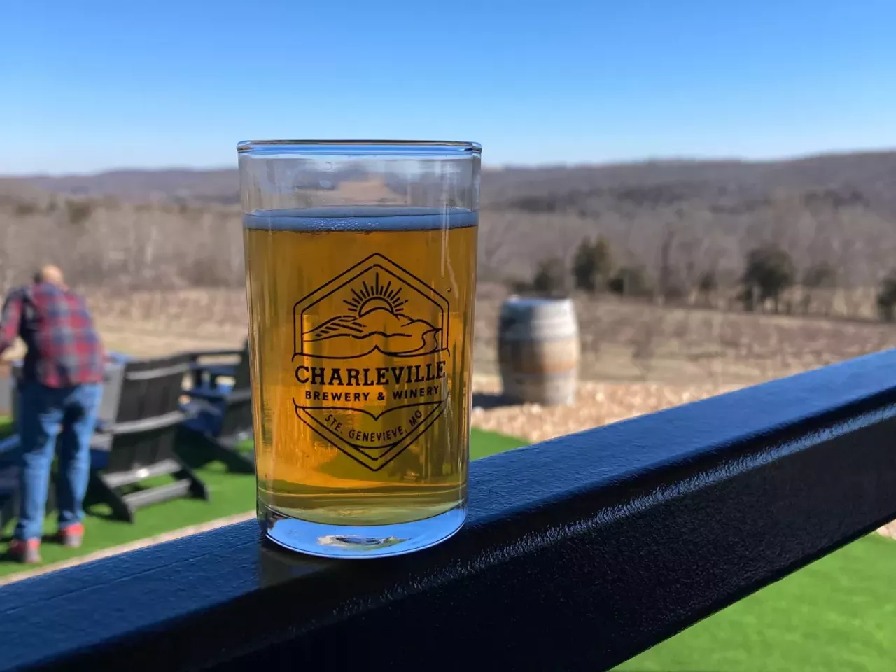 A beer glass stands on a fence outside at Charleville Brewery.