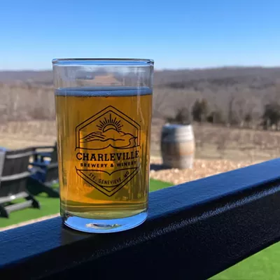 A beer glass stands on a fence outside at Charleville Brewery.