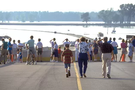 In Chesterfield, people head out to see the floodwaters after the Monarch Levee fails.