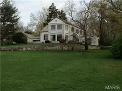 The 3,200-square-foot home sits on over an acre of land and was built in 1936.