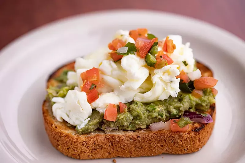 Avoca-Toast with whole-grain bread, avocado smash, egg whites, mozzarella and pico.