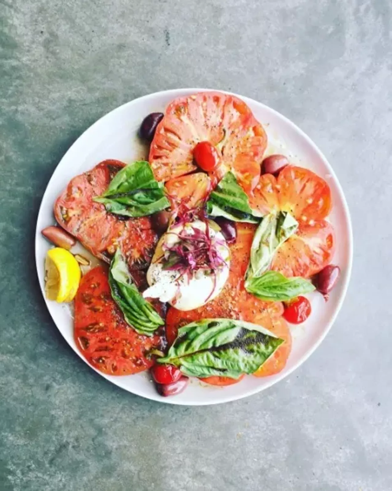Sherrie Castellano Instagram: withfoodandlove Blog: withfoodandlove.com A transplant from the East Coast, Castellano's blog focuses on gluten-free and vegetarian recipes. Pictured: heirlooms and burrata at Katie's Pizza and Pasta (9568 Manchester Rd., 314-942-6555). Photo courtesy of Instagram / withfoodandlove.