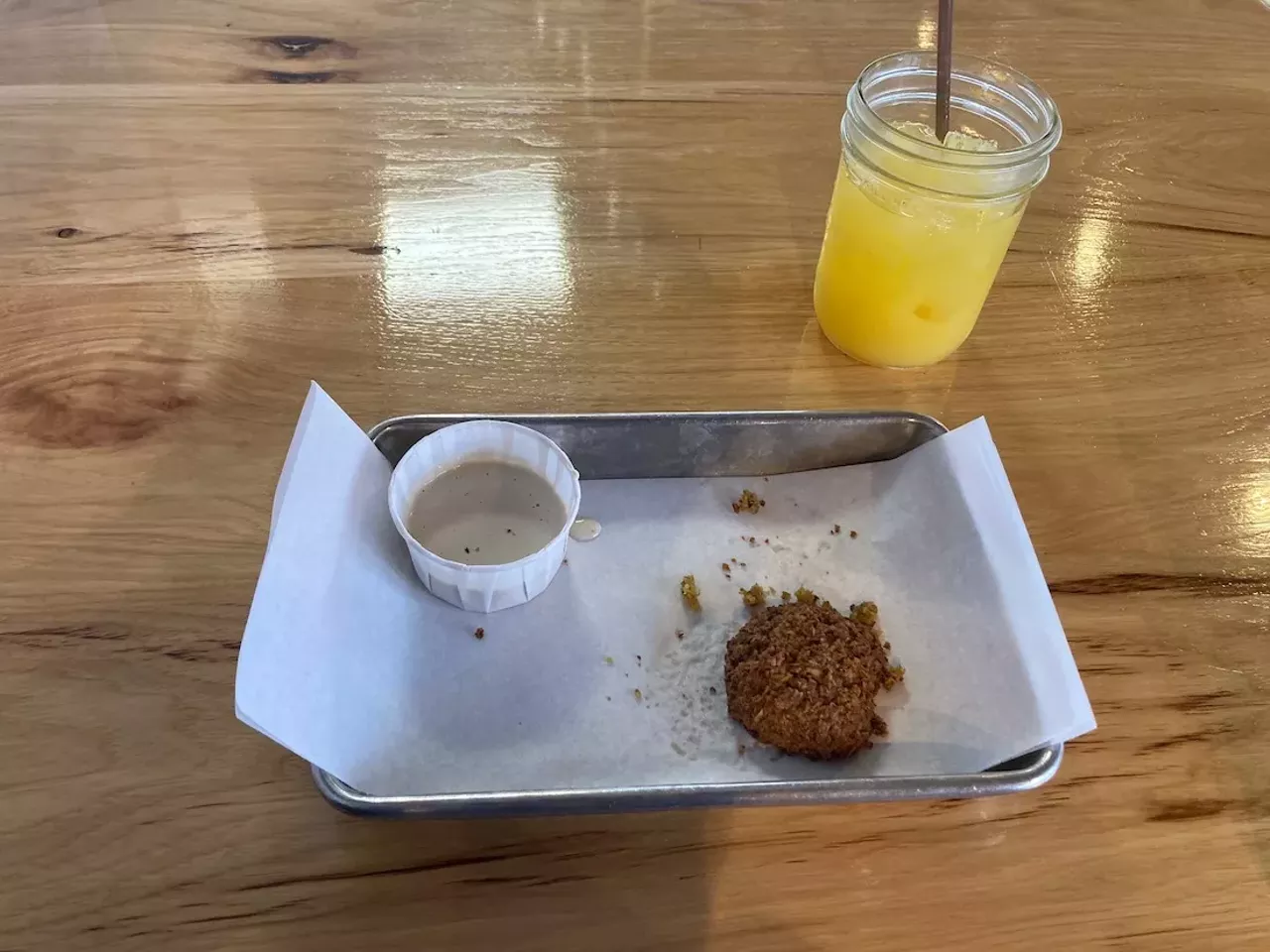Idiotically I went to the service counter without a plan, and in my panic ordered the first two things I saw, which were a screwdriver and some falafel. I overheard a woman strangely asking an employee where all the cats were, to which they told her she was probably thinking of Mauhaus, the cat cafe down the street. It was not in my original route, but I scarfed down my weirdo order and walked the few extra blocks to see it for myself, and took a quick picture of an animal I am actually allergic to. 