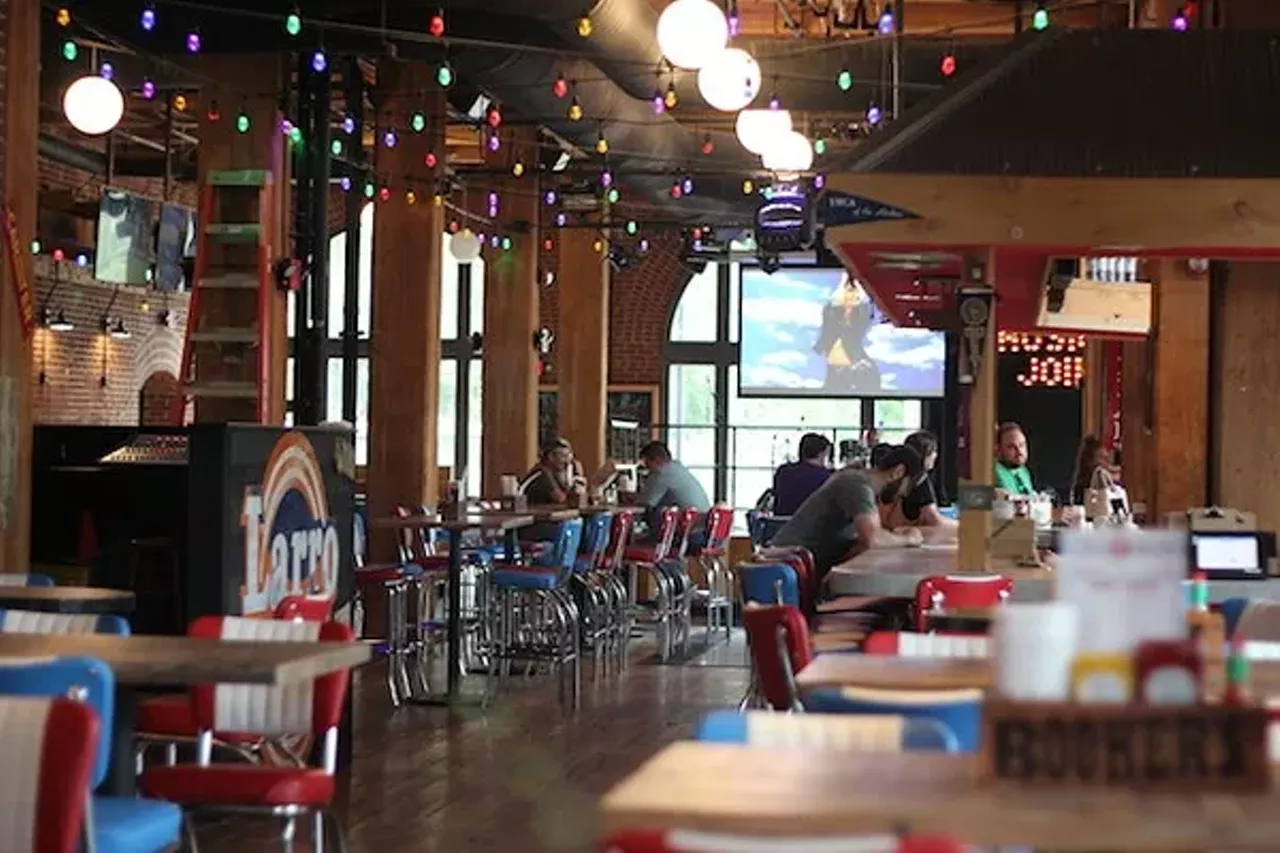 Tin Roof 1000 Clark Ave St. Louis, MO 63102 This Nashville transplant, which opened in the shadow of Busch Stadium last summer, is &#147;Margaritaville meets Cheers,&#148; in the words of its general manager. But while the vibe may be laidback, the music is hot -- and the party keeps going until after midnight seven nights a week. Three big bars -- including one outdoors -- will keep you lubricated even on nights when the place is packed. Photo by Sarah Fenske