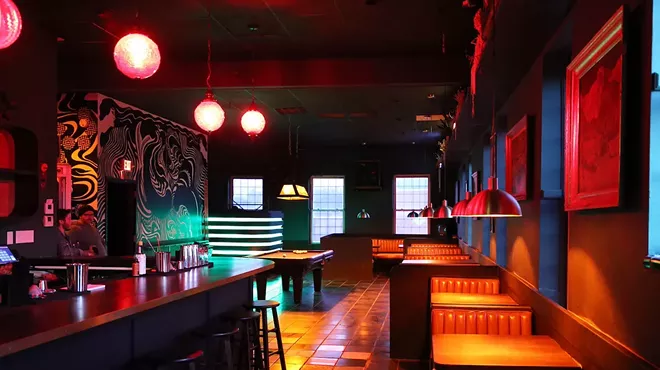 View toward the DJ booth at Kenny's Upstairs, with Amanda Hohman's mural to the left.