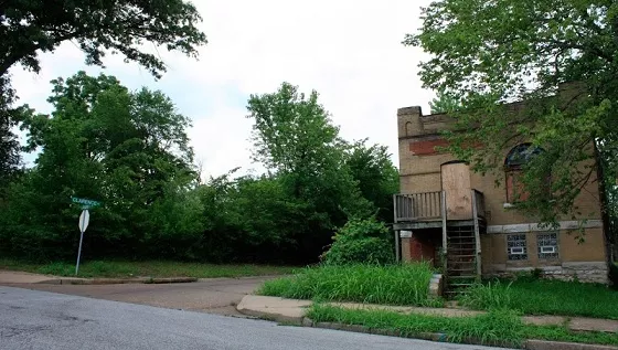 The empty lot to the left is all that remains of the Berry property on Labadie Avenue. - Chris Naffziger