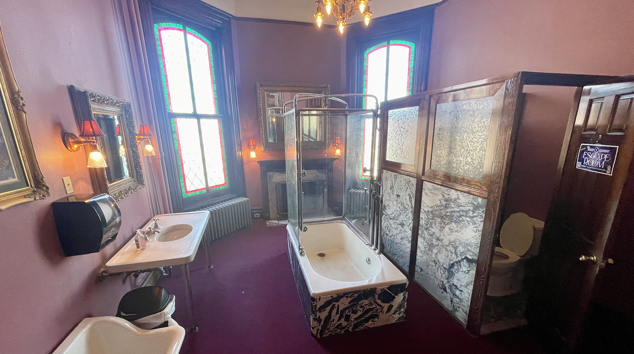 Lemp Mansion The women's bathroom at Lemp Restaurant and Inn (3322 Demenil Place) is one for the ages. By this we simply mean that the bathroom fits the aesthetic of the 1860s, with an authentic bathroom setup and decor — minus the stalls. Two things that caught our attention 1) an actual bathtub in the bathroom — in the middle of the room, mind you; 2) the beautiful wood fireplace. The two-stall, burgundy bathroom feels grand with its high ceilings, chandelier and extra lighting, giant stained-glass windows, rich wood trim, marble and wall-to-wall carpet. Our favorite part is the fact the stall walls go all the way down to the floor and there's real doors on them giving you ultimate privacy while you're pretending to be doing your business in the 1800s.