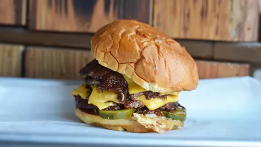 The massive four-patty The Captain burger at Mac's Local Eats in St. Louis