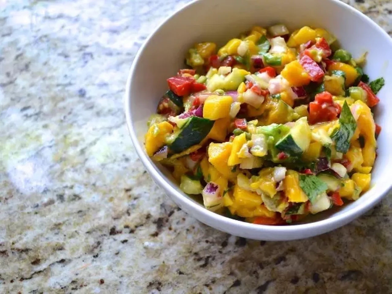 The Ostercamps Instagram: newlywedchefs Blog: thenewlywedchefs.com This husband and wife duo has an entire blog devoted to "keeping a fresh outlook on life, love, and food." This photo features their mango salsa. Photo courtesy of Instagram / newlywedchefs.