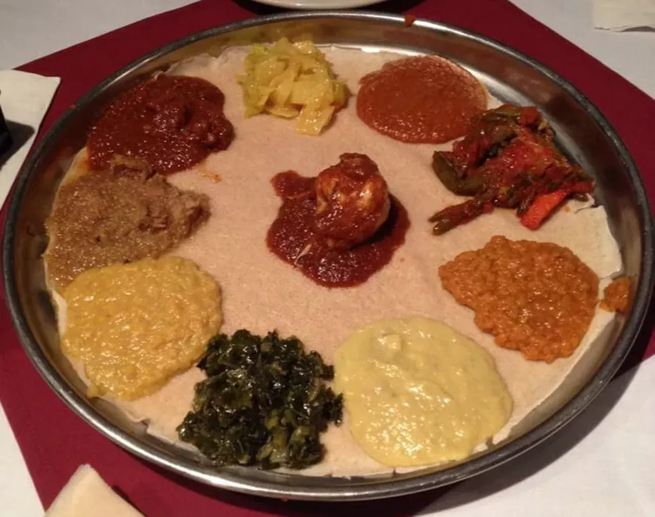 Meskerem 3210 S Grand Have you ever had Ethiopian food? Located on South Grand, Meskerem is a great place to try the east African cuisine. Order a platter, tear off some injera, and start filling up -- eating with your fingers is A-OK here. Make sure to stay for the Ethiopian coffee provided at the end of the meal -- you&#146;ll be glad you did! Photo via Yelp / Mallory G.