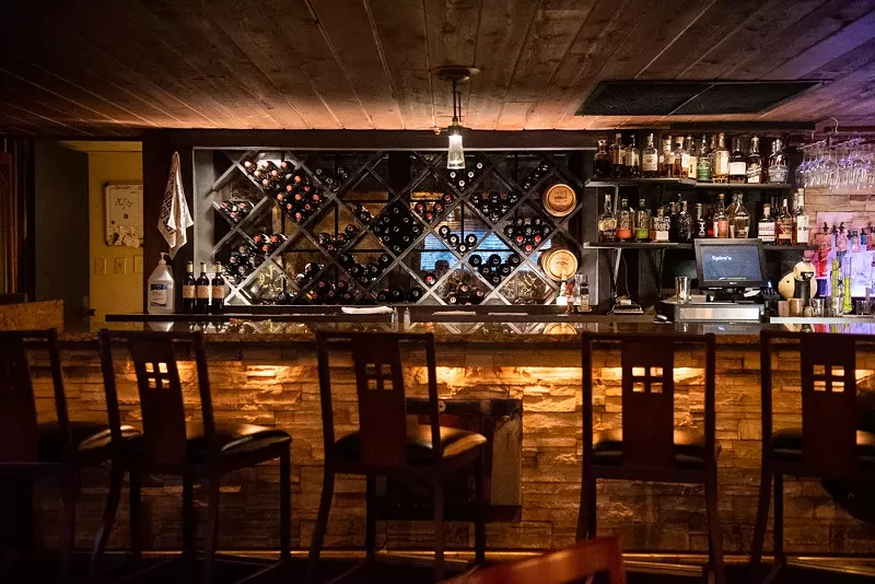 The bar at Spiro's is a Chesterfield gathering place. - Vu Phong