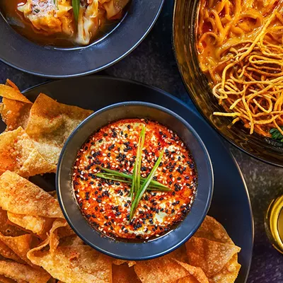 From left clockwise, lychee gimlet cocktail, siu mai, khao soi, Desperado cocktail and edamame “hummus” at Stews Food & Liquor in Soulard