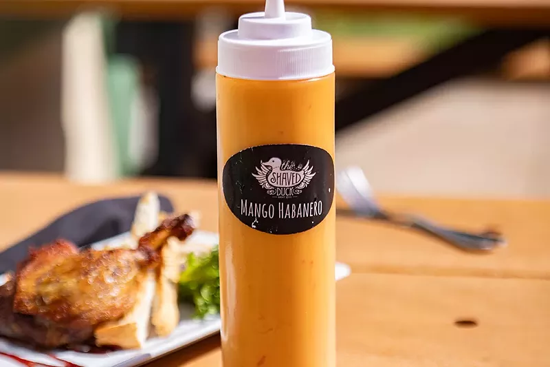 House sauces include a delicious mango habanero. - MABEL SUEN