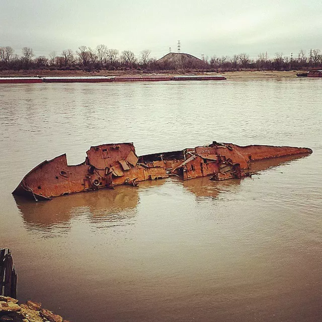 Wreckage Of The USS Inaugural Rutger St., St. Louis, MO This mine sweeper was a museum ship in St. Louis until the flood of '93, when it was swept downriver. It's now stuck to the side of the river in south city and you can visit it when the water level is low. Photo courtesy of bigb80 / Instagram