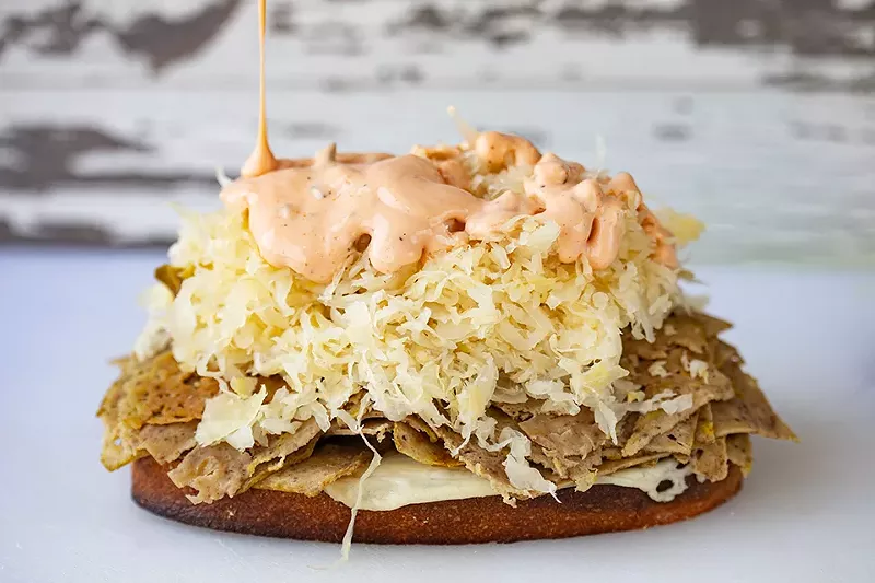 The Reuben is topped with faux corned beef, swiss cheese, sauerkraut and thousand island dressing on rye bread. - MABEL SUEN