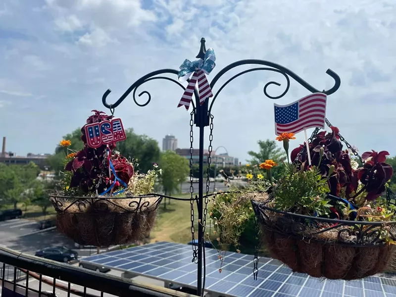 A close-up of the flower baskets shows a fibrous liner likely caught fire from cigarettes. - Courtesy of Paul Hamilton