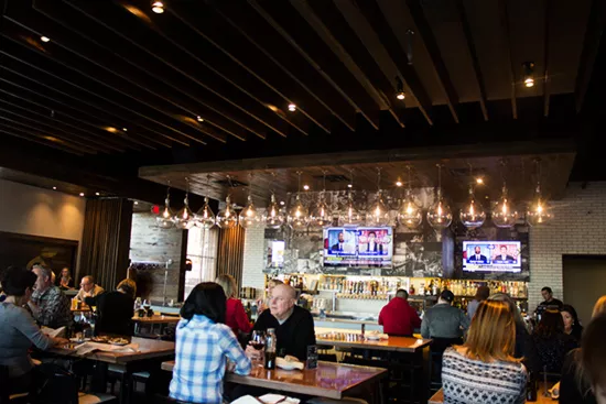 Happy hour is offered in the bar area.